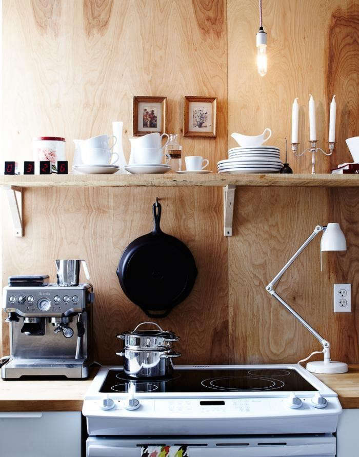 Open shelves and hooks on a kitchen wall. Photograph by Angus Fergusson, from Steal This Look: Toronto Kitchen by Jennifer Hannotte.