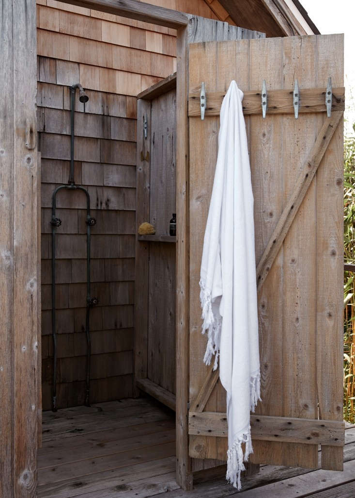 Have outdoor storage needs? Consider weather-proof, hardwearing nautical cleats. The towel hooks Ann and Lori chose for their outdoor shower are Galvanized Dock Cleats; $3.24 each at Boatstore. For more ideas, go to Nautical Hardware: 7 Cleats for Home Use.