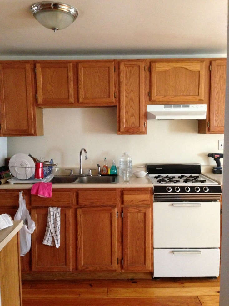 The cupboard and vent removal took place over a winter weekend (during which three pipes burst), and the wall spackling, sanding, and painting the following weekend.