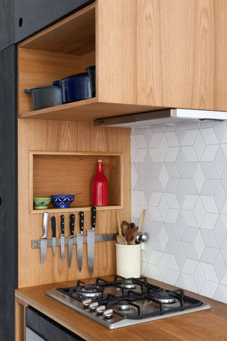 Trotter is also a stylist—and it shows in her designs. Open cubbies, alongside closed cabinets, allow homeowners to both store and show off pretty cookware, ceramics, or dinnerware.