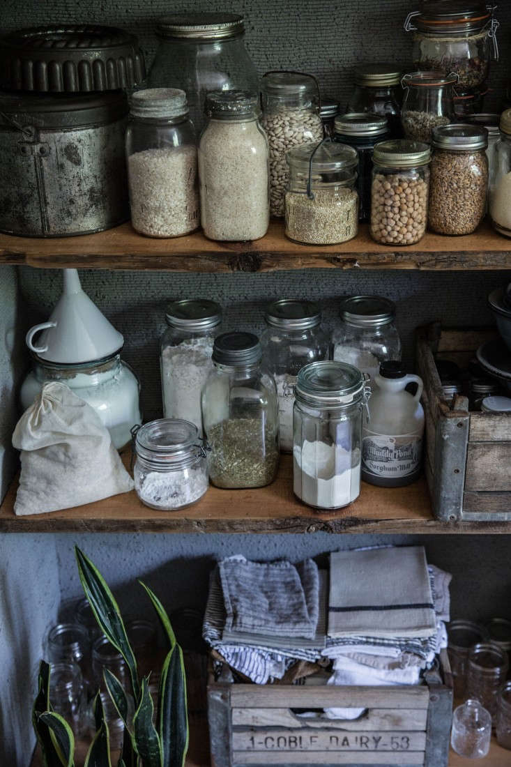 An open pantry in the North Chattanooga, Tennessee, kitchen of Local Milk blogger Beth Kirby, was designed by Jersey Ice Cream Co. and fabricated in one month. See the rest of the moody space in The One-Month Makeover: Beth Kirby’s Star-Is-Born Kitchen. Photograph by and courtesy of Beth Kirby.