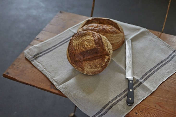 Wrapping bread in a linen towel is an effective way to contain and clean up the crumbs. Photograph by Julia Spiess for Dinners with Friends, from 10 Tips: How to Create a Laid-Back Thanksgiving, Northern-California Edition.