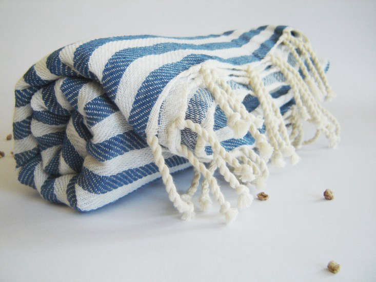 A Turkish Bath Towel that Hilary uses as a tablecloth and picnic blanket; $22.64 on Etsy.