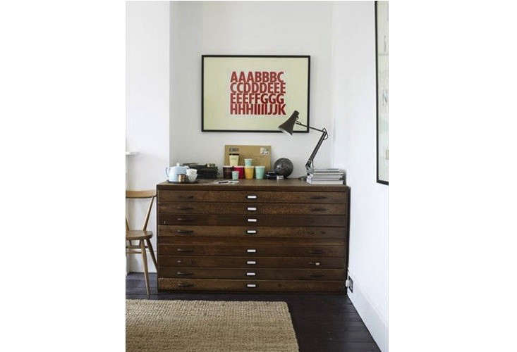 A dresser drawer made from dark wood flat files. Photograph by Emma Mitchell seen on Desire to Inspire.