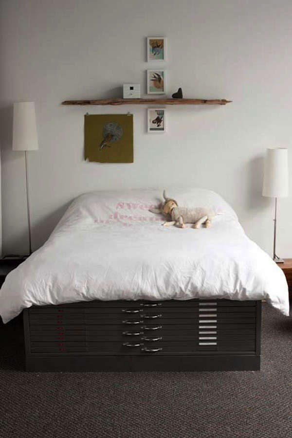 File cabinets at the foot of the bed form an extension to a custom-built wooden frame made by Greg and Grey, owners of Portland, Oregon, shop Antler & Co.Photograph via Design Sponge.