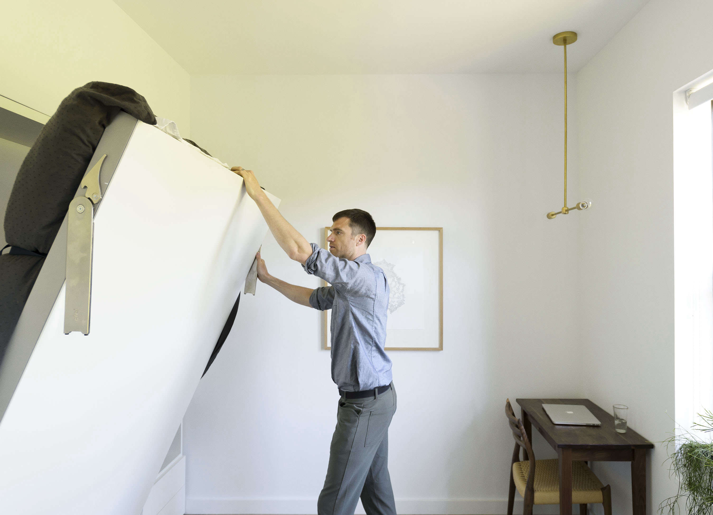 Clei Murphy bed in Jacqueline-Schmidt and David Friedlander's 675-square-foot Brooklyn quarters, Matthew-Williams-photo | Remodelista