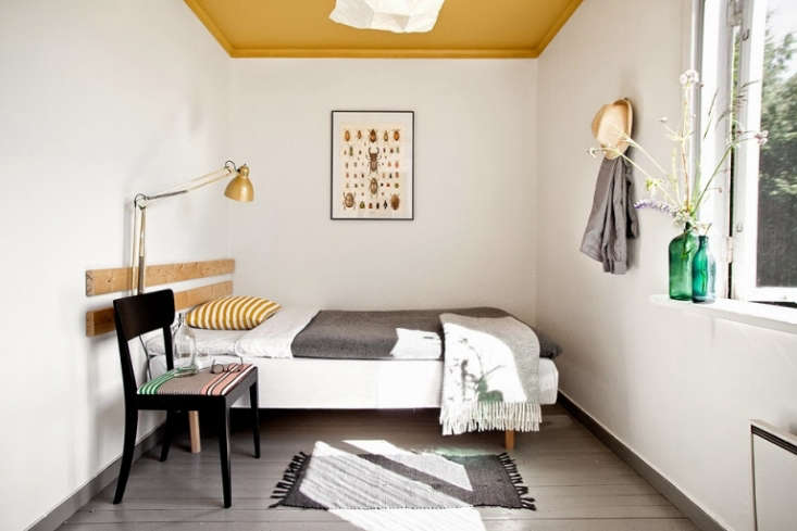 sagverket sawmill bedroom yellow ceiling sweden