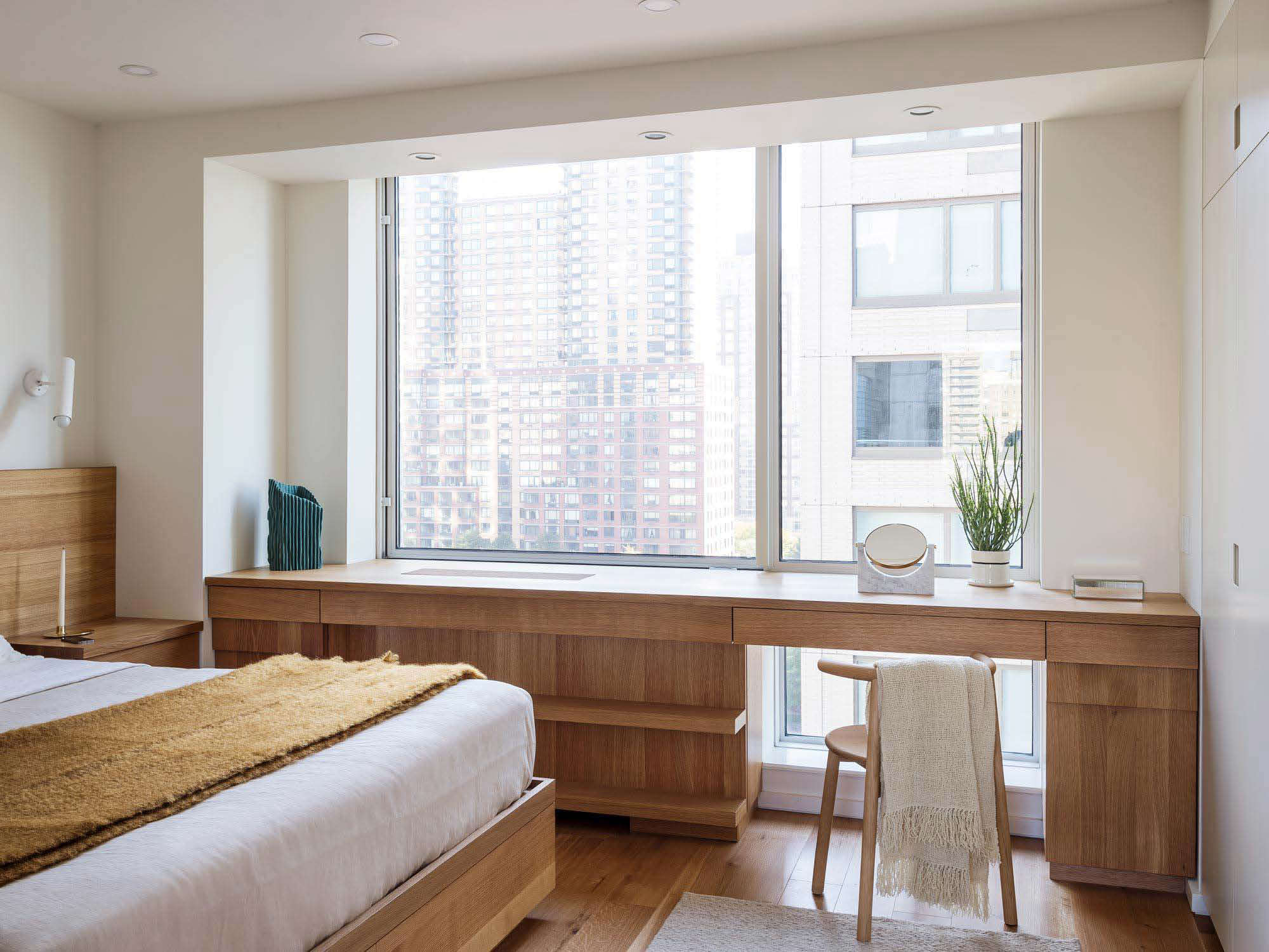 Workstead-design bedroom with custom oak vanity/desk