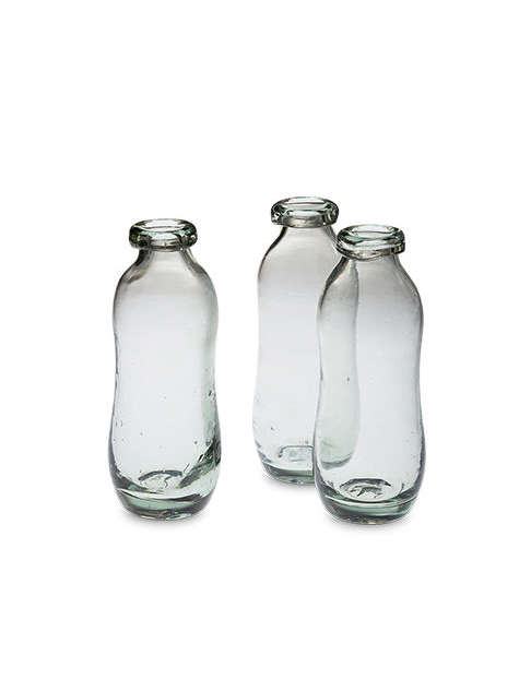 https://media.organized-home.com/wp-content/uploads/2017/02/merci-recycled-glass-bottles-e1531342519961.jpg