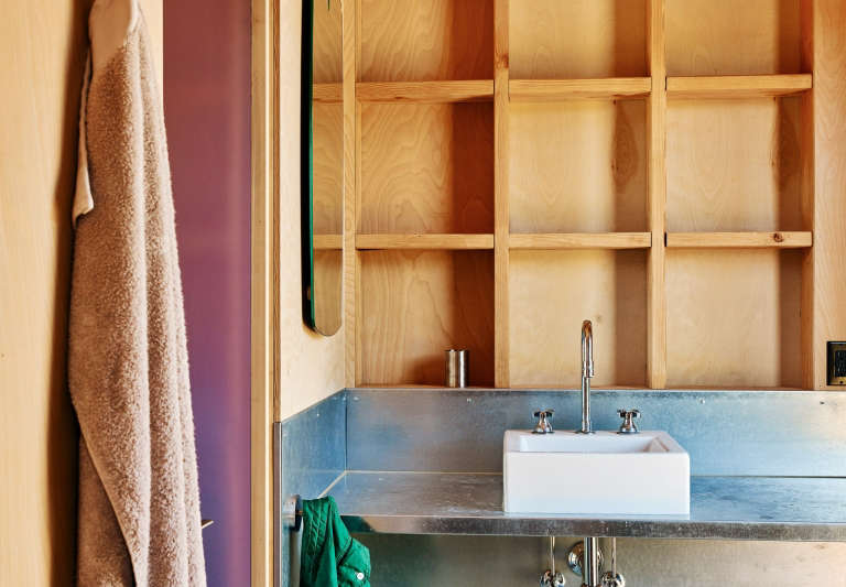 Pool House Bathroom with Metal Siding Plywood Cubbies in Healdsburg