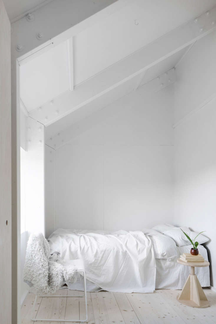 A simple bedroom under the eaves.