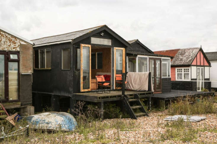 Marcia Mihotich and Durrell Bishop's tiny fixer-upper beach house in Seasalter, England. Photo via The Modern Hous