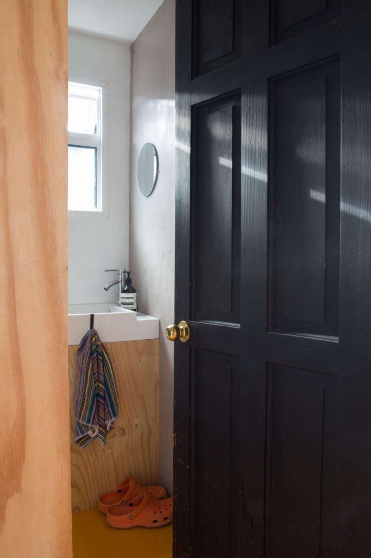 Tiny plywood bathroom in Marcia Mihotich and Durrell Bishop's Seasalter, England, beach house. Marcia Mihotich photo.