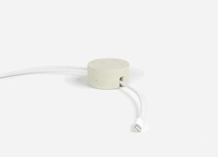 The Cord Keeper by design studio Human Crafted uses pale, reinforced concrete to keep up to three unplugged cables in place. Made in Madison, Wisconsin, it’s $16.