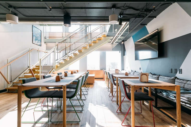 Communal dining room in modern WeLive co-living space in Arlington, VA