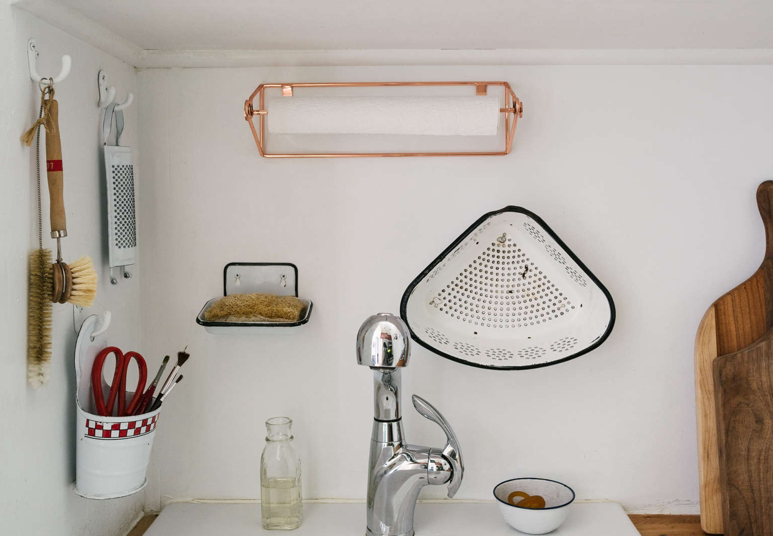 Aha! Hack: Tension Rod as Paper Towel Holder - The Organized Home