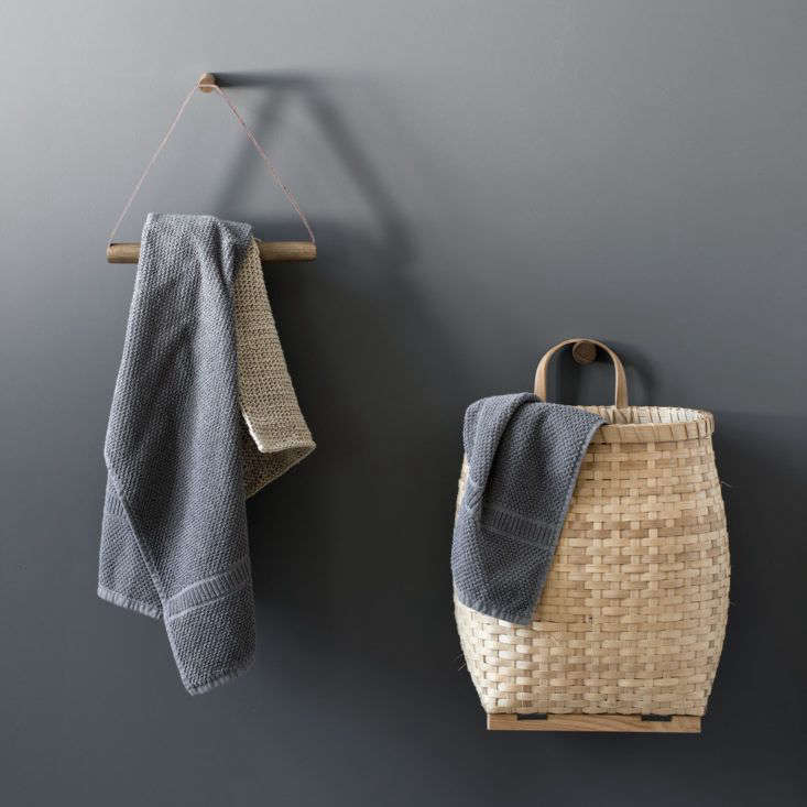 Leather and wood towel hanger and smoked oak Knot knob from By Wirth, Denmark.