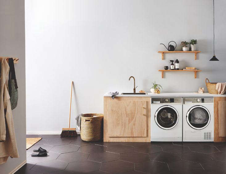 Combination laundry and mudroom room by Homestyle magazine, New Zealand. Fisher-Paykel washer/dryer. 