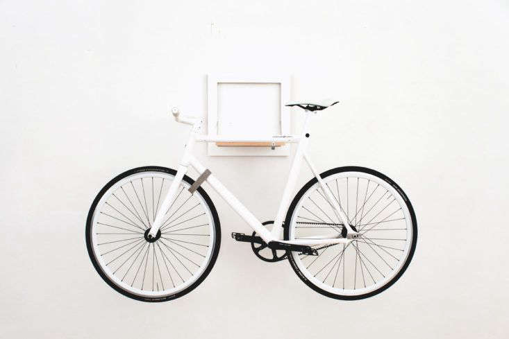 Handmade in Berlin, the wall-mounted Slit bike holder (shown in white) is made of plywood that folds out to hold your bike and folds flat against the wall when not in use. It has a felt surface to prevent scratches and also comes in black; €225.