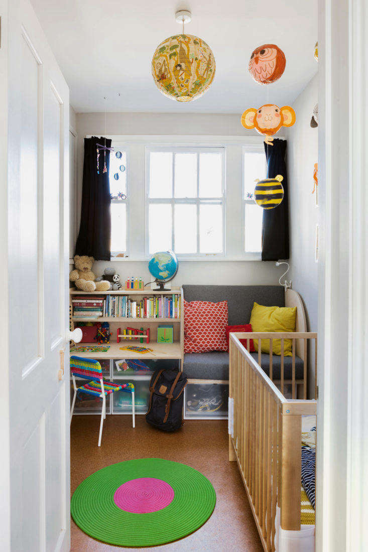 Kids colorful room with built in furniture in remodeled London apartment 