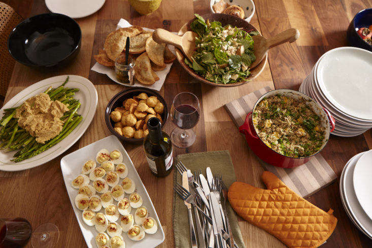 At serial host George McCalman’s buffet dinners, guests serve their own food and grab their own silverware and plates. Photograph by Kelly Marshall, from Expert Advice: How to Organize a Dinner Party with Minimal Effort.