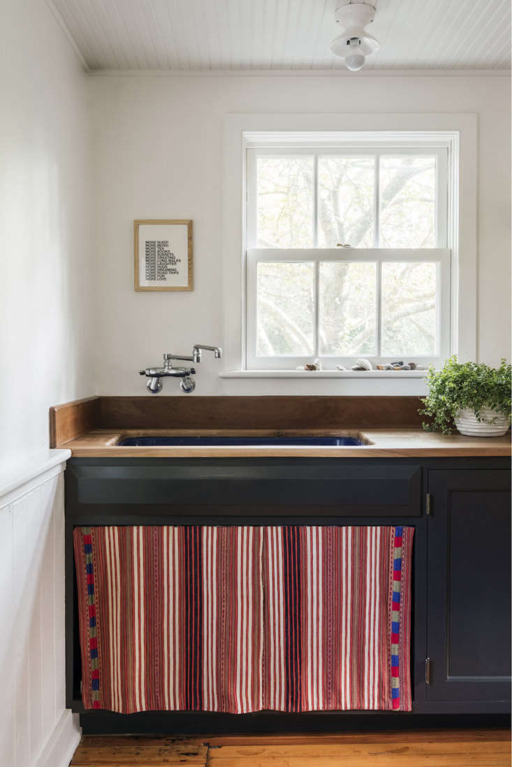 A Remodelista favorite, Elizabeth Roberts had a sink skirt sewn from a vintage Guatemalan textile for her beach house. See Elizabeth Roberts at Home: The Architect’s Own Beach House in Bellport, NY. Photography by Dustin Aksland and Eric Striffler, courtesy of Elizabeth Roberts.