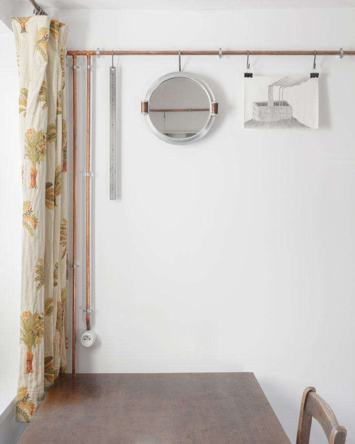 Living Area with Copper Pipes in Shaker Studio Airbnb in Paris by Ariel Claudet, Photo by Cyrille Lallement