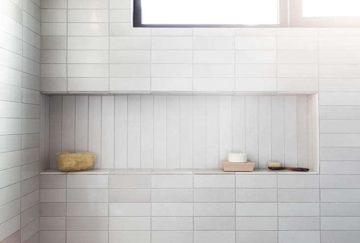 The vertical tiles in this niche are a nice contrast to the horizontal tiles around it. Photograph by Laure Joliet, courtesy of Tamar Barnoon, from Bathroom of the Week: In LA, a Softer Take on Black and White.