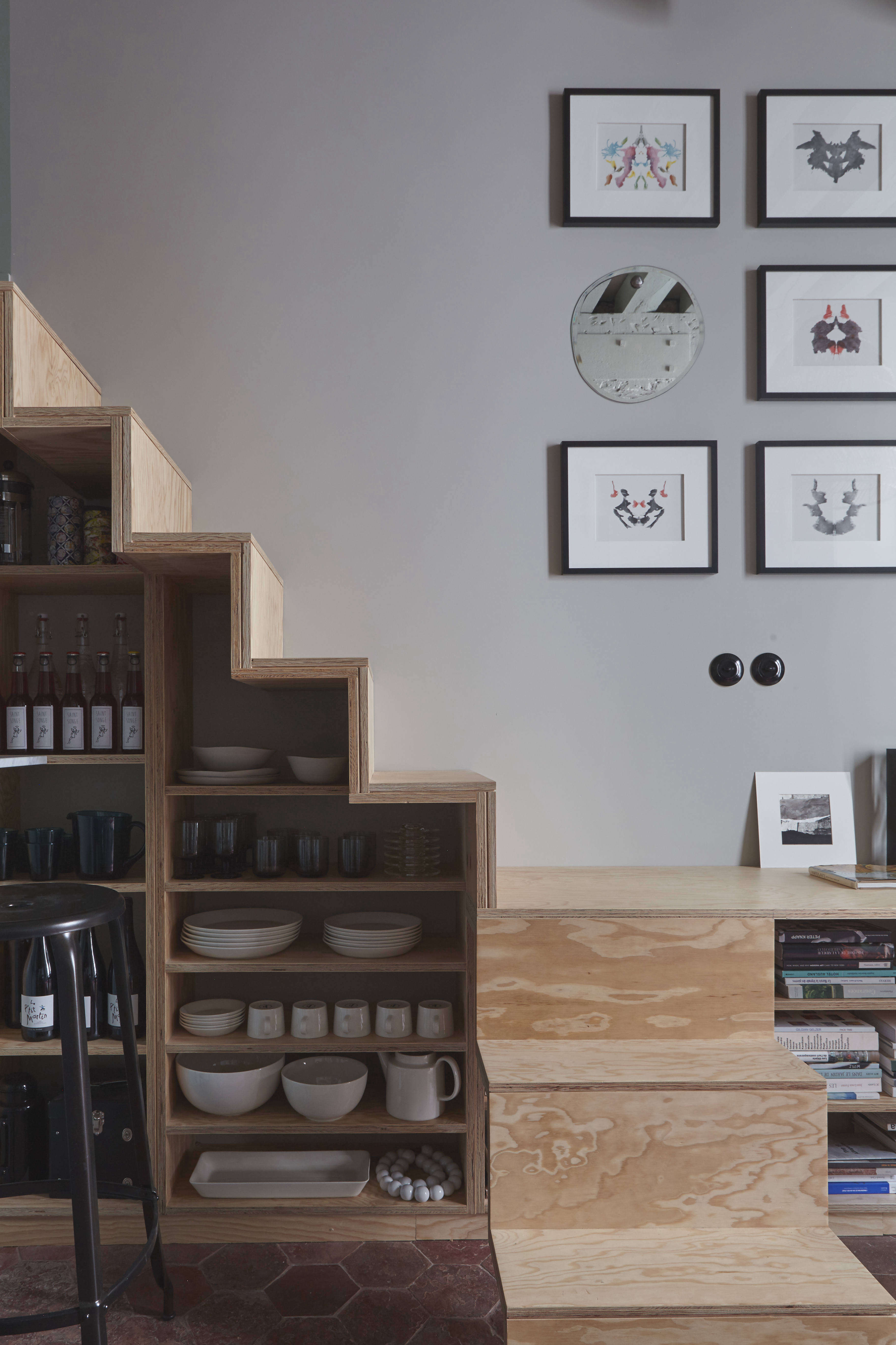 Staircase Shelving in Tiny Paris Apartment by Marianne Evennou