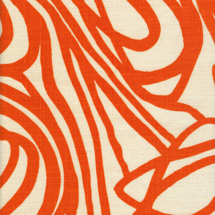 Close-up photo of a fabric sample, featuring abstract, fluid bright orange lines on an off-white background.