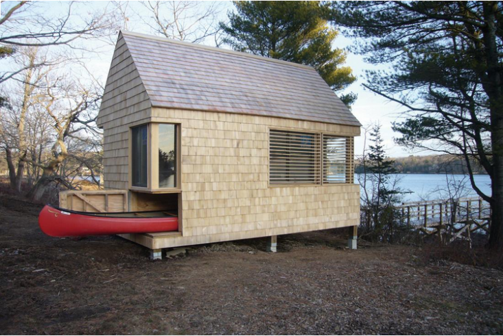 Sitting lakeside in Westport, Maine, this tiny writer’s studio doubles as canoe storage. Designed by firm Cheng + Snyder, the interior features walls of built-in bookcases and a wraparound desk. See more in Outbuilding of the Week: A 190-Square-Foot Writer’s Studio in Maine. Photograph courtesy of Cheng + Snyder.