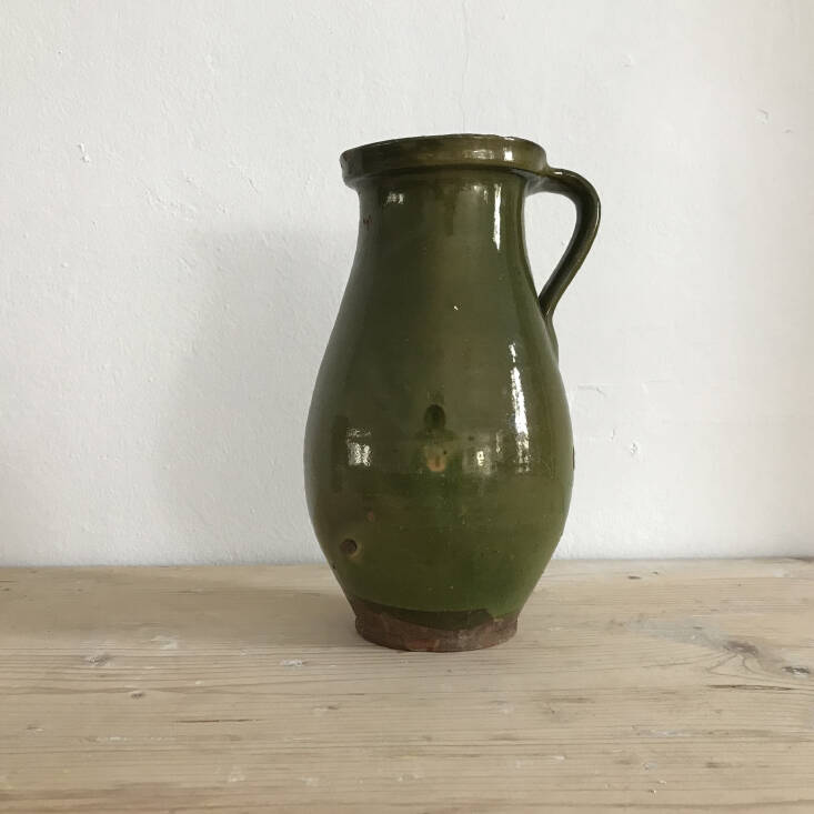 This Antique Pitcher in Terracotta from Greek homeware store TRELA is glazed in a deep, olive green, and was hand-thrown in Hungary in the 19th century. The jug’s classic silhouette lends itself well to wooden instruments; €90.00.