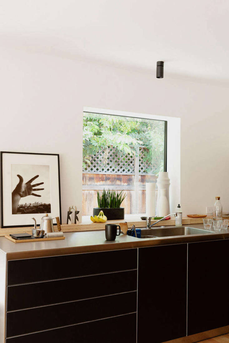 Architect Takashi Yanai’s Los Angeles kitchen is about the size of a walk-in closet. He installed sleek stainless steel fixtures, including the sink and counters, from German cabinetry company Bulthaup’s B3 line. Read more about the project in Kitchen of the Week: Architect Takashi Yanai’s Galley Kitchen–and study–in LA. Photograph by Ye Rin Mok from Creative Spaces.